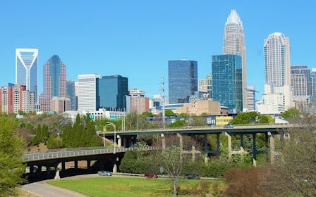 A bridge over a river in a city.