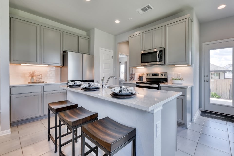 Hamilton plan kitchen for Eastwood at Sonterra in Jarrell, TX by Century Communities
